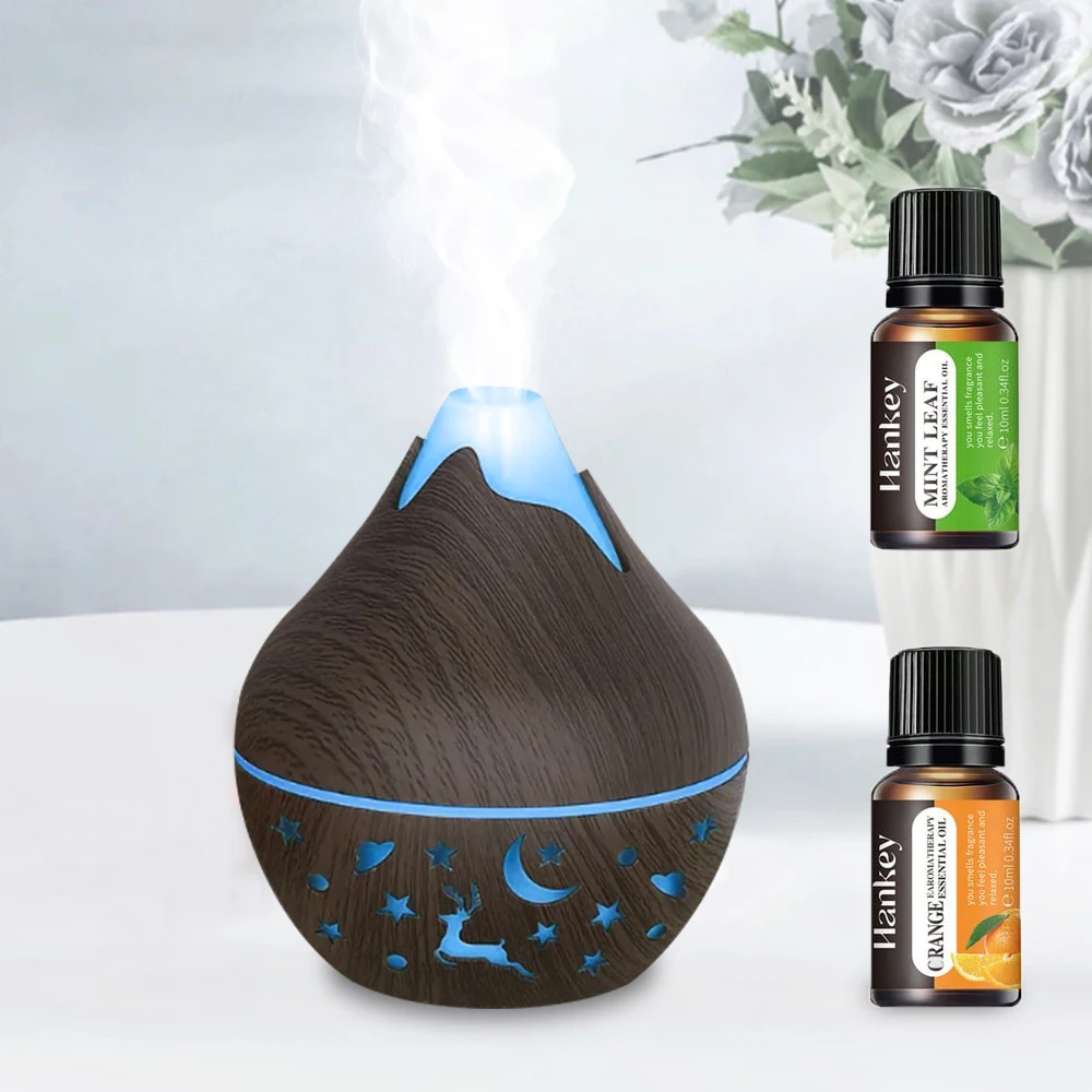 

New 200ML USB Air Humidifier Electric Aroma Diffuser Mist Wood Grain Oil Diffuser have 7 LED Light Humidifier and two bottles of
