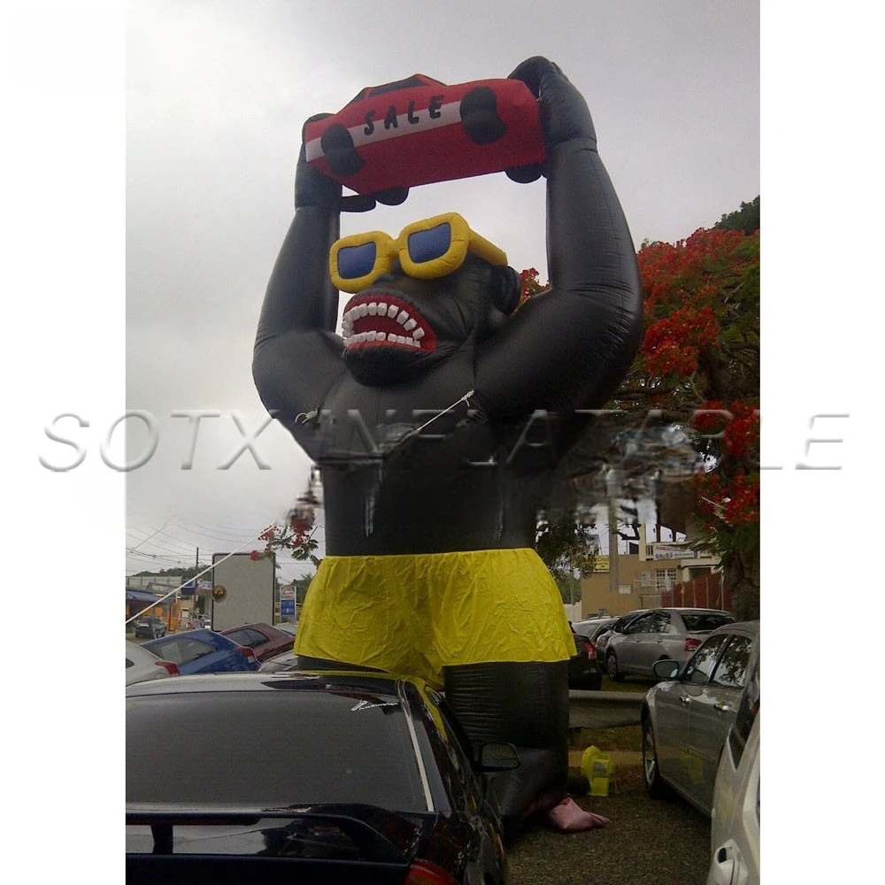 for advertising 20ft tall black inflatable gorrila with yellow shirts,sunglasses and SALE car