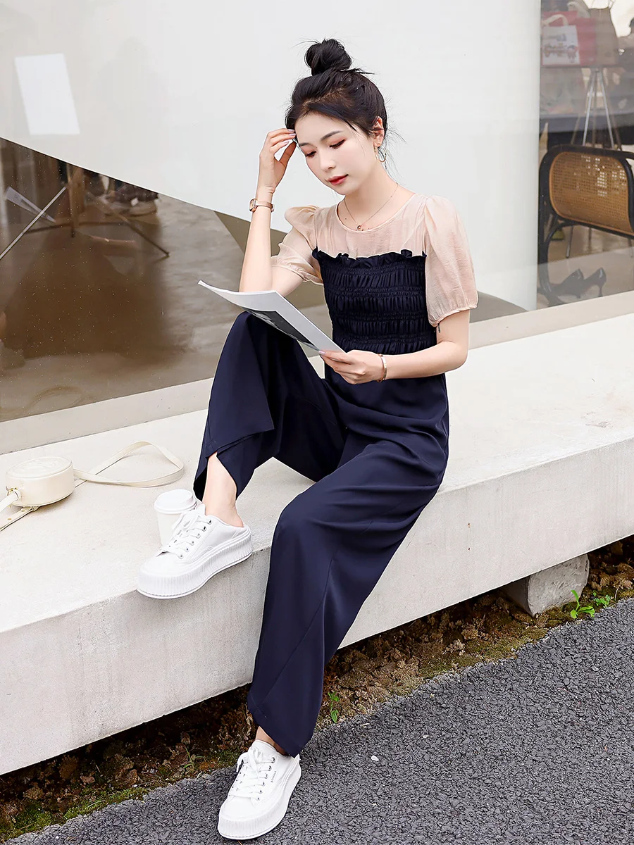 กางเกงเอวสูงแฟชั่นผู้หญิง สไตล์ลำลองสำหรับฤดูร้อน รุ่นใหม่ ช่วยให้ดูผอม ทรงขากว้าง จั๊มพ์สูทใส่สบาย เหมาะกับการเดินทาง ผ้าบางเบา...