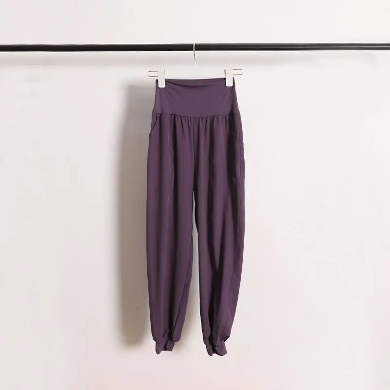 Damskie spodnie do jogi z średnim stanem, modelujące pośladki, do biegania, fitness, długie, elastyczne, szybkoschnące spodnie sportowe.