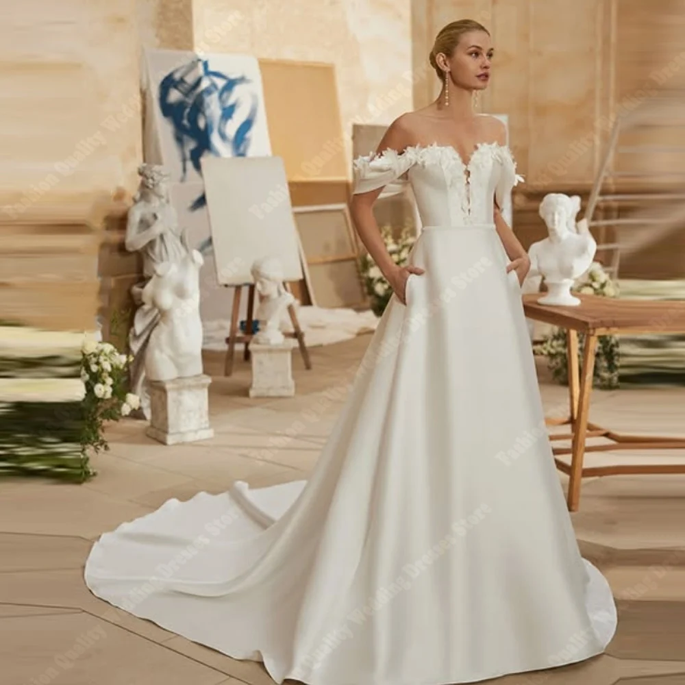 ลูกไม้ที่สวยงามพิมพ์ผู้หญิงชุดแต่งงานเซ็กซี่แขนกุดชุดเจ้าสาววินเทจส่องแสงรูปลอกออกแบบเดรส เดอ โนเวียที่กำหนดเอง