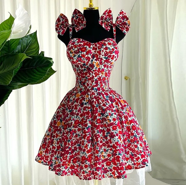 

Women's fashionable temperament elegant floral suspender bow high waist slimming A-line skirt short skirt summer new style