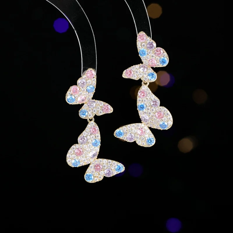 Pendientes de mariposa doble de diamante exquisito para mujer, aguja de plata 925, temperamento de lujo ligero, diseño de interés especial que combina con todo