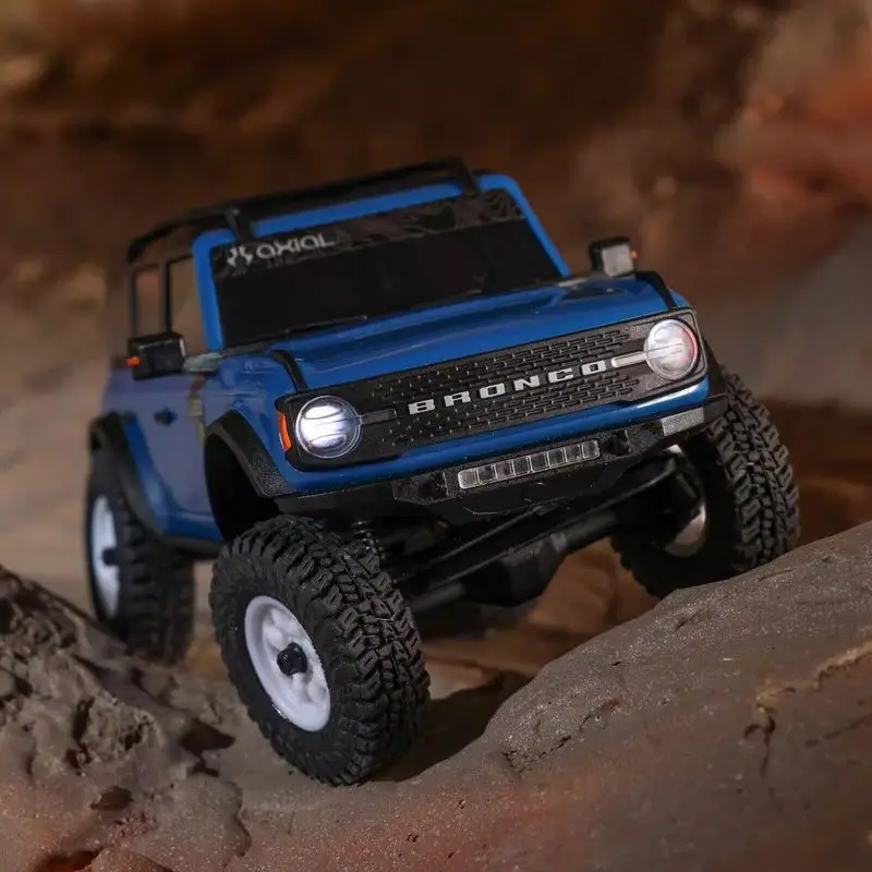

Радиоуправляемая модель внедорожника Axial 1/30 SCX30, масштабная имитационная модель, электрическая, полноприводная, с коллекторным двигателем 2S, для бездорожья, подарок