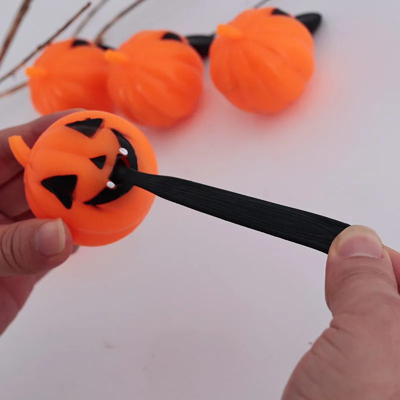 Halloween Finger Slingshot Pumpkin Light Spooky Toys Multifunctional TPR Pull Tongue Vent Ball LED Light-up Projectile Ball Toys