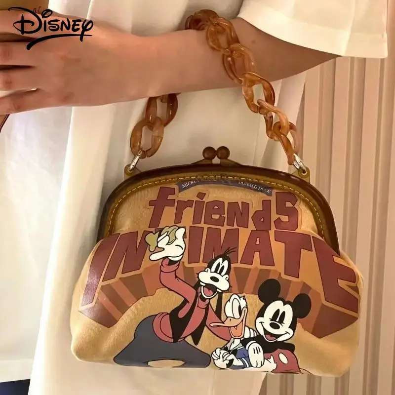 

2024 New Disney Commuter Hand Bag Kawaii Mickey Donald Duck Goofy Cute Anime Print Daily Cosmetic Mobile Phone Lady Clip Bag