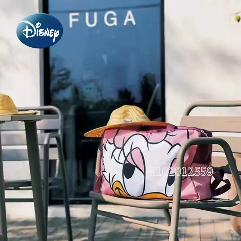 Nuevo bolso de viaje Disney Donald Duck para mujer, bolso de viaje portátil de dibujos animados, bolsa de almacenamiento impermeable de gran capacidad, alta calidad