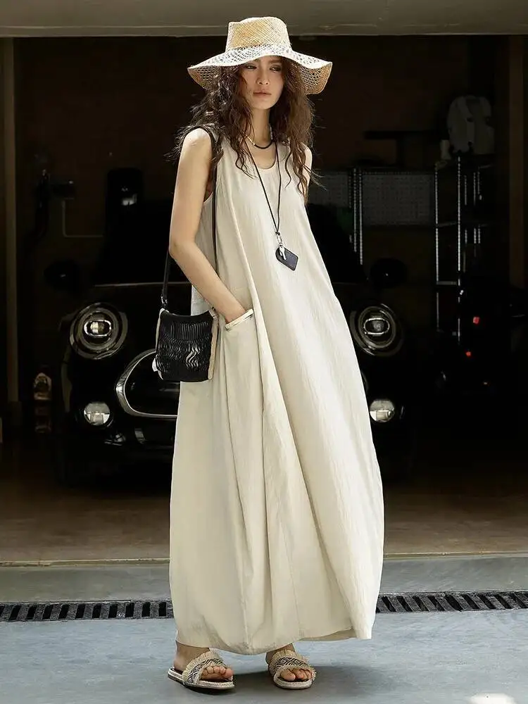 HUISONG femmes kaki brève poche décontracté longue élégante bourgeon robe nouveau col rond sans manches mode marée printemps été 2025 pr3inq