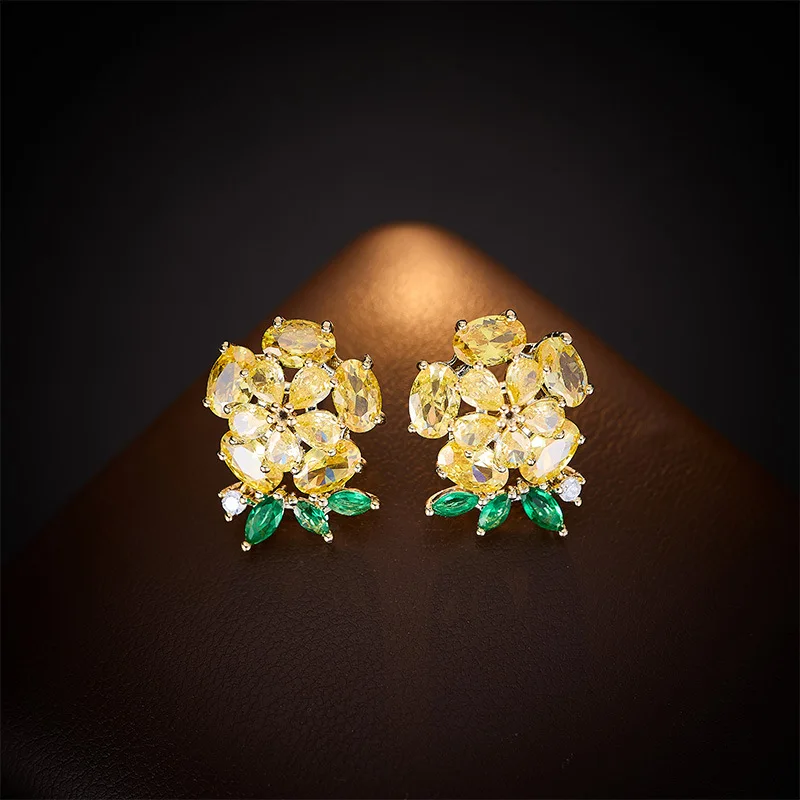 

Fashionable colored copper-inlaid zircon individual sweet flower earrings, niche design sense light luxury style stud earrings