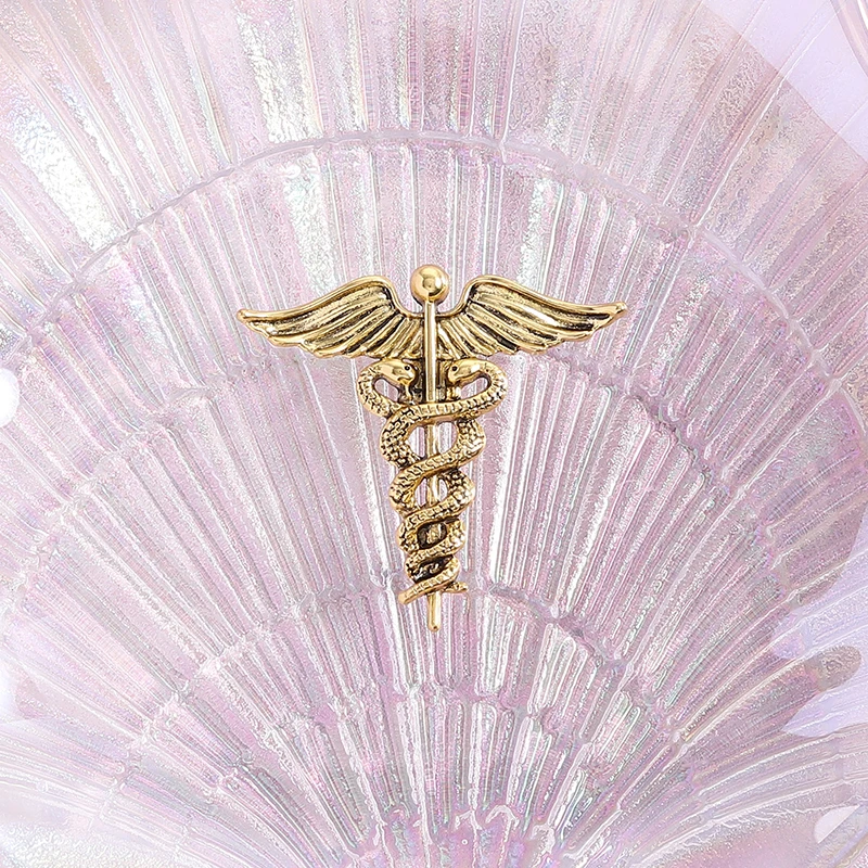Retro Medizinische Caduceus Emaille-Anstecknadeln Medizinsymbol Flügel mit Schlangen Brosche Schmuck Geschenke für Ärzte Krankenschwestern Rucksack Revers Abzeichen – Detail 10