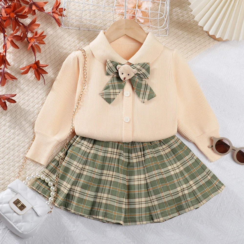 

Girls Sweater Sets 2024 Autumn/Winter New Girls Polo Neck Little Bear Necktie Knit Top+Plaid Pleated Skirt Two Piece Set