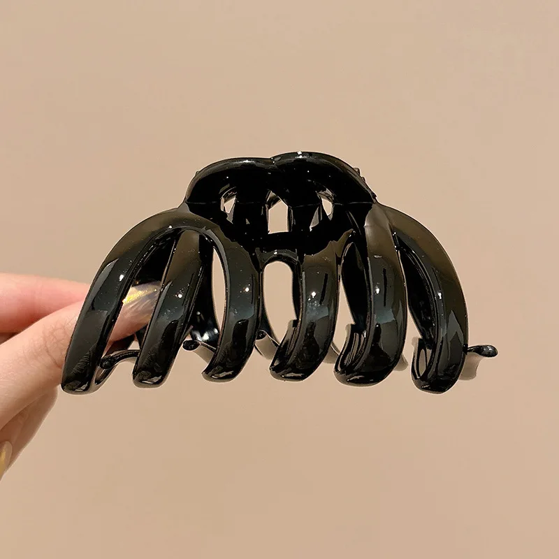 Large hair clip for voluminous, retro updo with pumpkin and shark hair clips, high-value headwear.