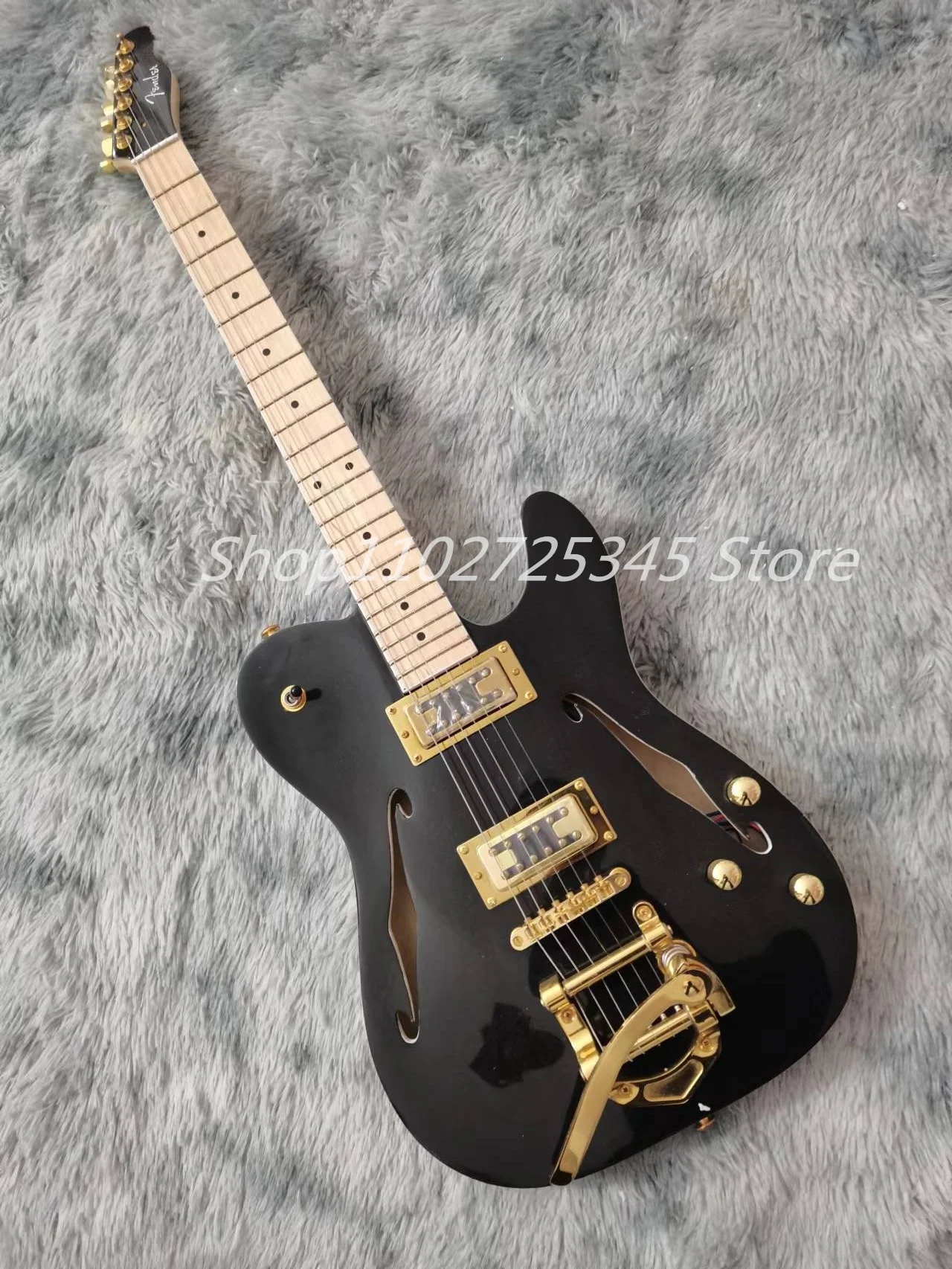 

Electric Guitar Maple Fingerboard, Gold Accessories, Tremolo System, Seller to Bear Shipping Costs