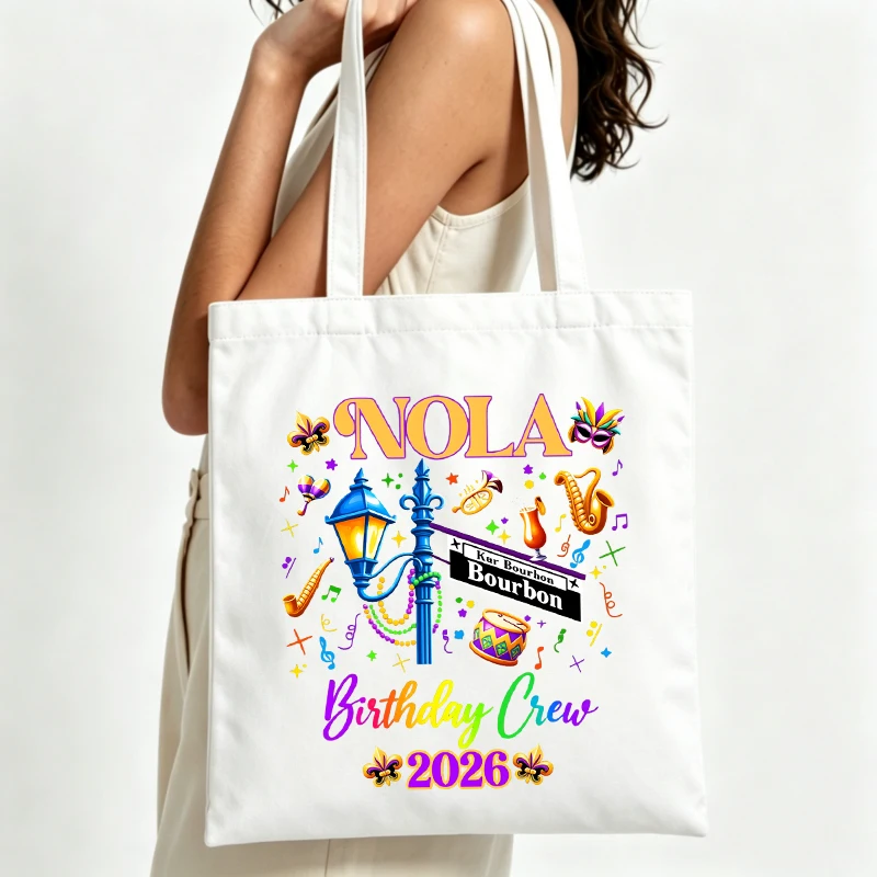 Women's Mardi Gras graphic canvas tote bag with street sign and musical elements, ideal for festival outings and casual daily