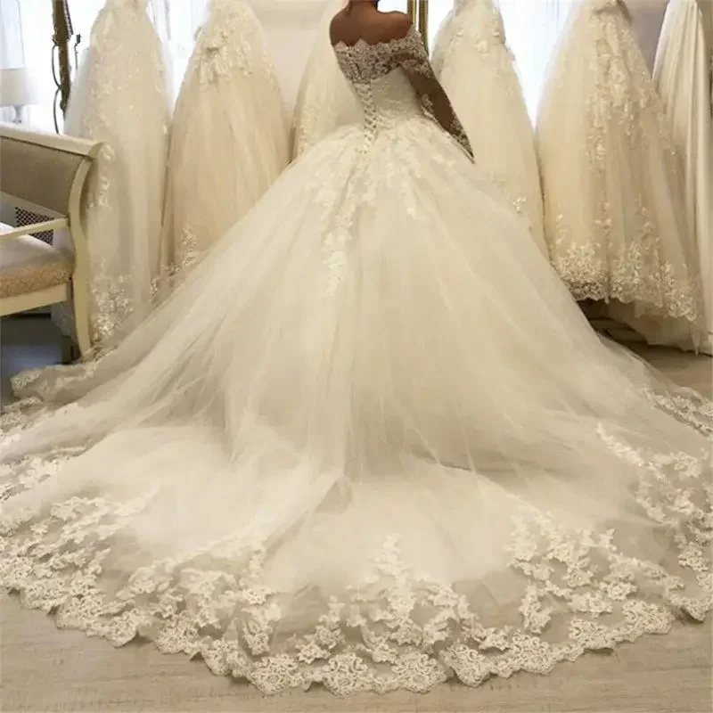 فساتين زفاف مخصصة بأكمام طويلة قبالة الكتف فساتين زفاف Vestido Noiva Casamento مزينة بالدانتيل مشد Ballgown زي العرائس