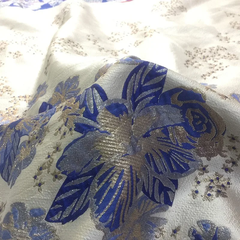 

The jacquard dress for evening is made of fashionable gold silk brocade fabric