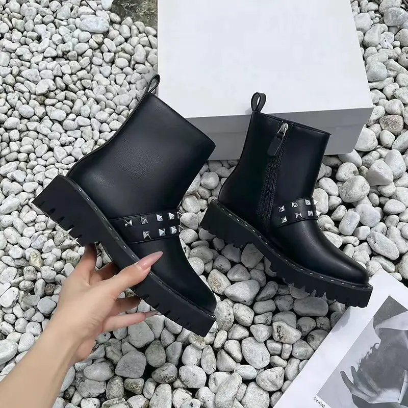 

Black rivet style round-toe platform short boots with internal zipper closure