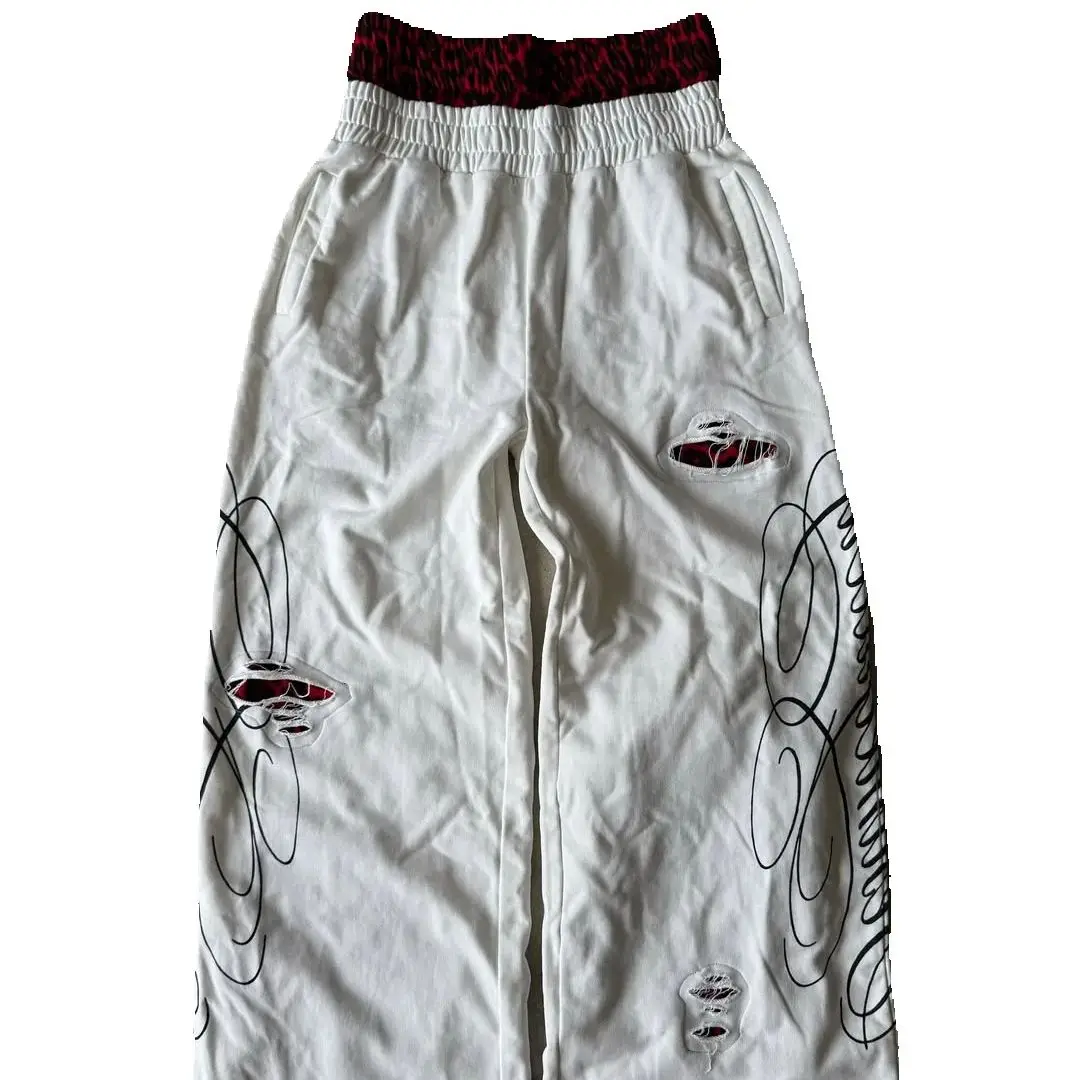 Nuevo diseño de agujero retro estampado de leopardo pantalones casuales de doble cintura pantalones de hombre pantalones de calle sueltos de moda para hombres y mujeres