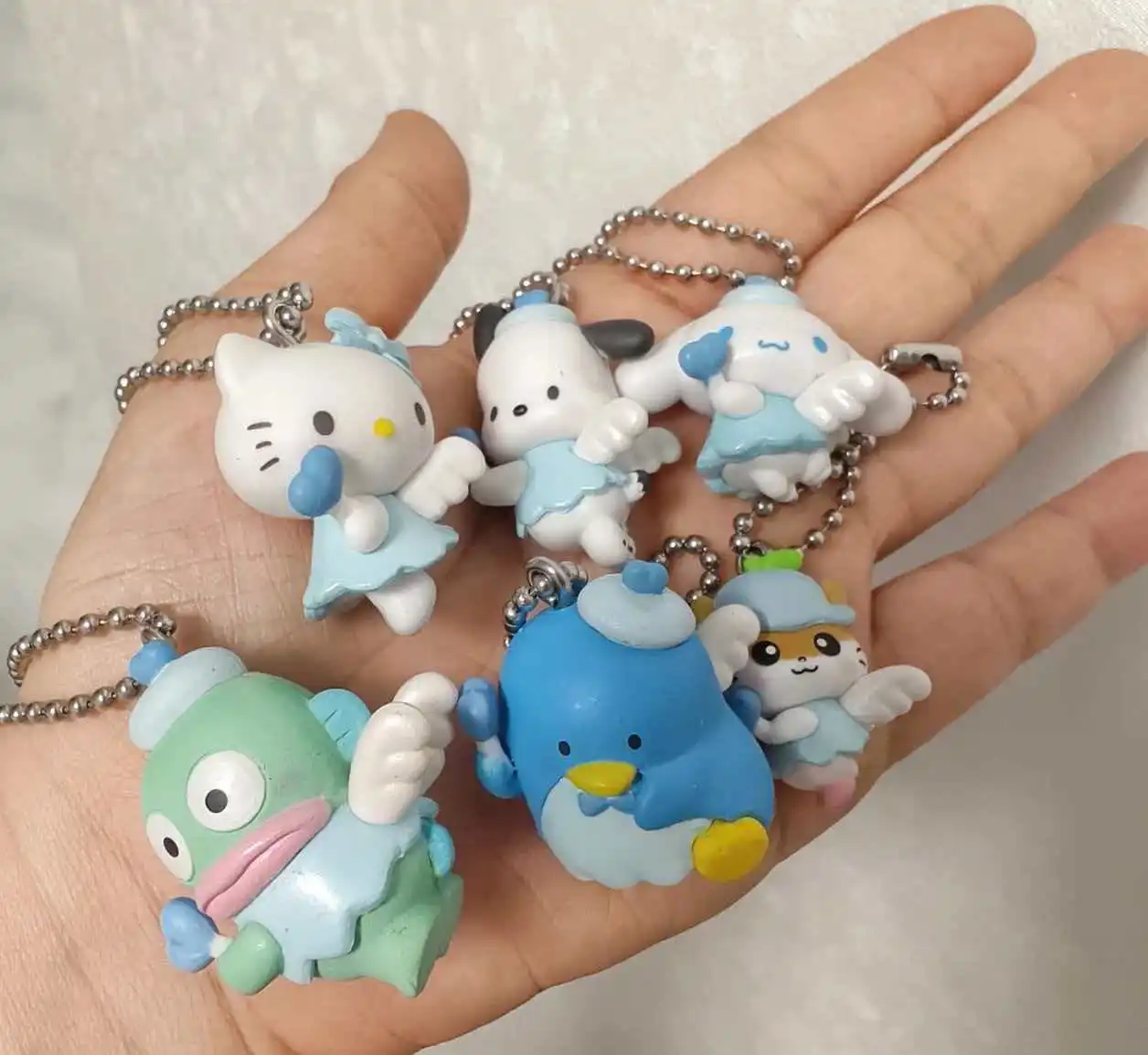 

Серия подвесок-блоков Kuromi Pochacco Cinnamoroll: коллекционные фигурки Kawaii Angel, модные игрушки, подарки на праздники для женщин