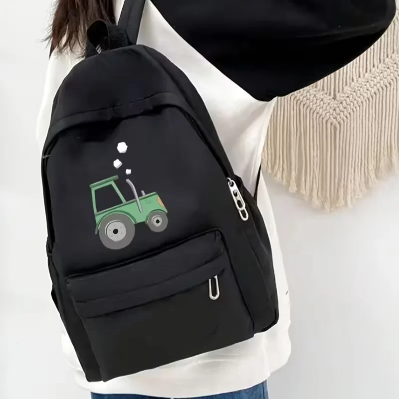 

A cute cartoon-themed back-to-school backpack with a car print, perfect for everyday use when going to school.