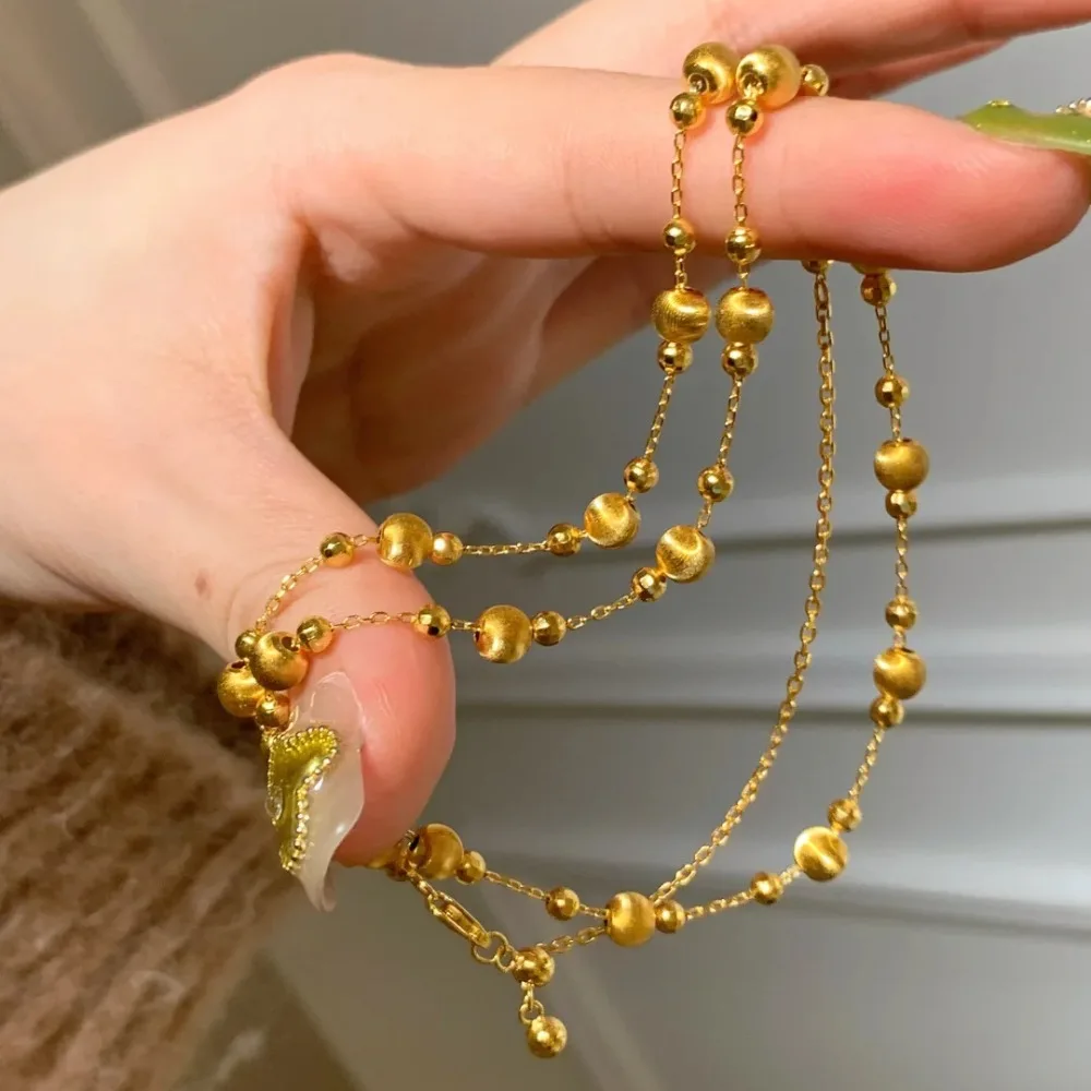 Female small design sense cat eye beaded broken gold simple imitation gold collarbone chain 9999gold