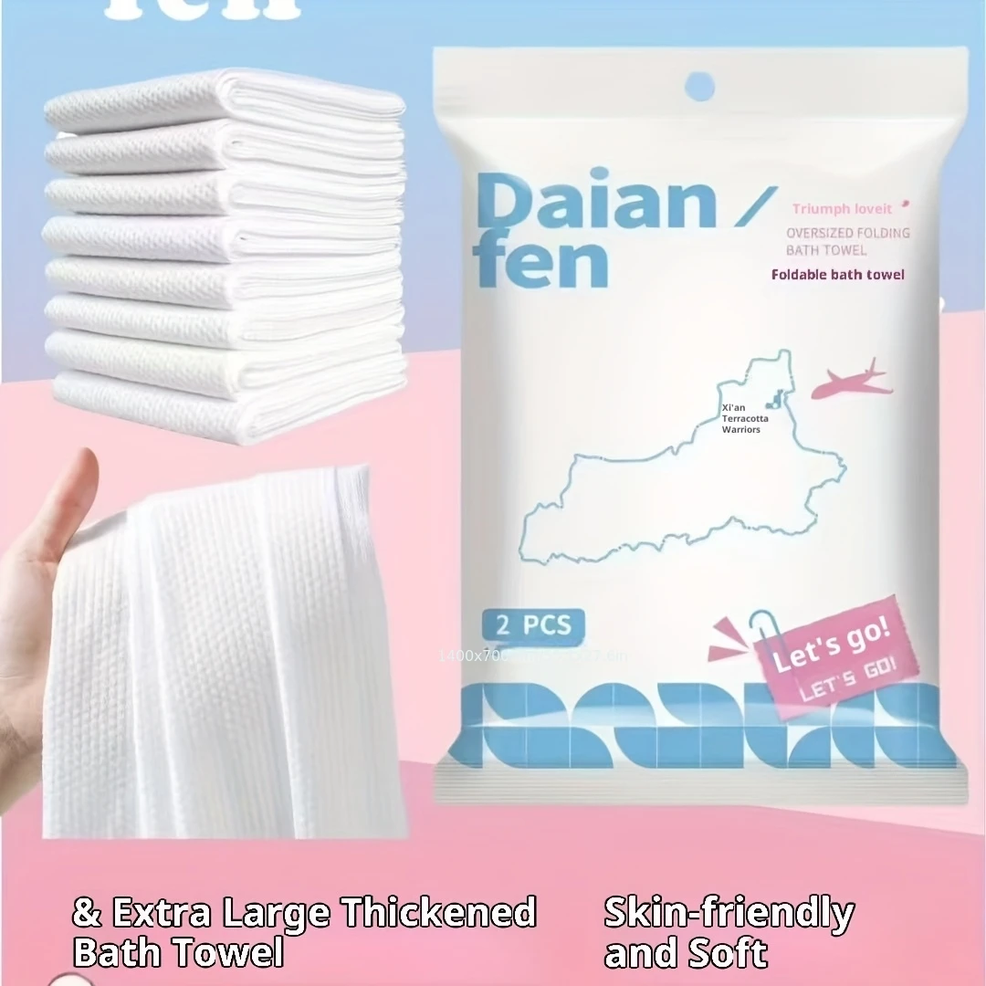 2 pieces of disposable bath towels, extra-large, strong, and absorbent, designed specifically for travel situations.