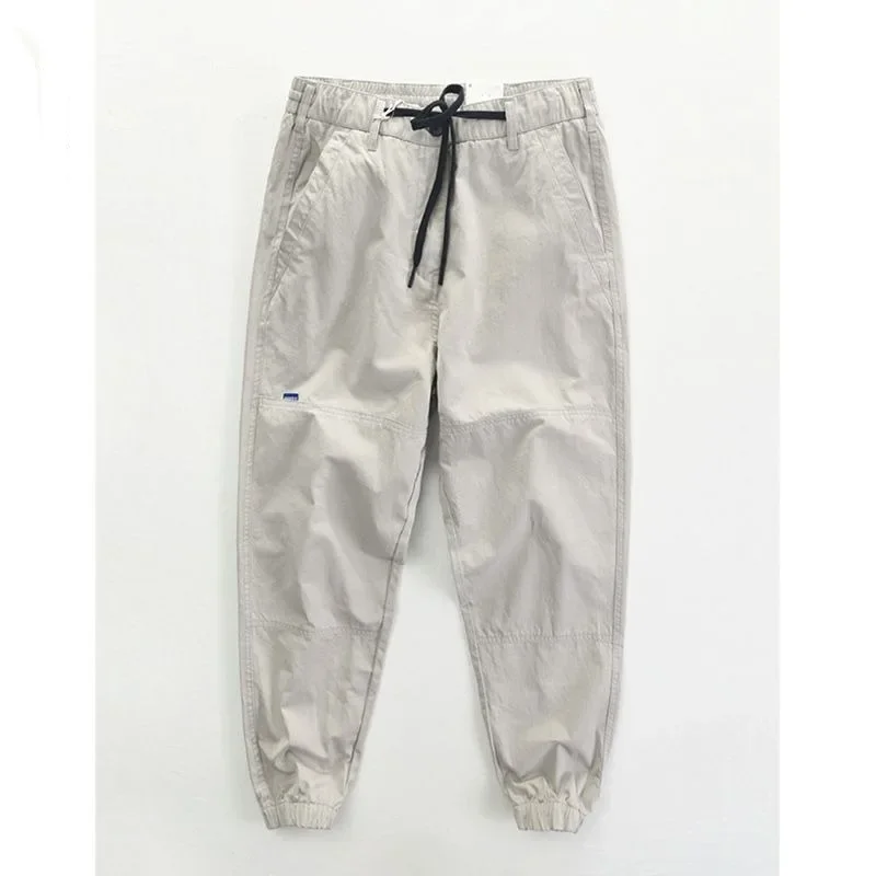 Spring and Autumn Men\'s Loose Solid Color Versatile Pocket Tie Feet ShirringBandage Casual Fashion Elegant Commuter Work Pants