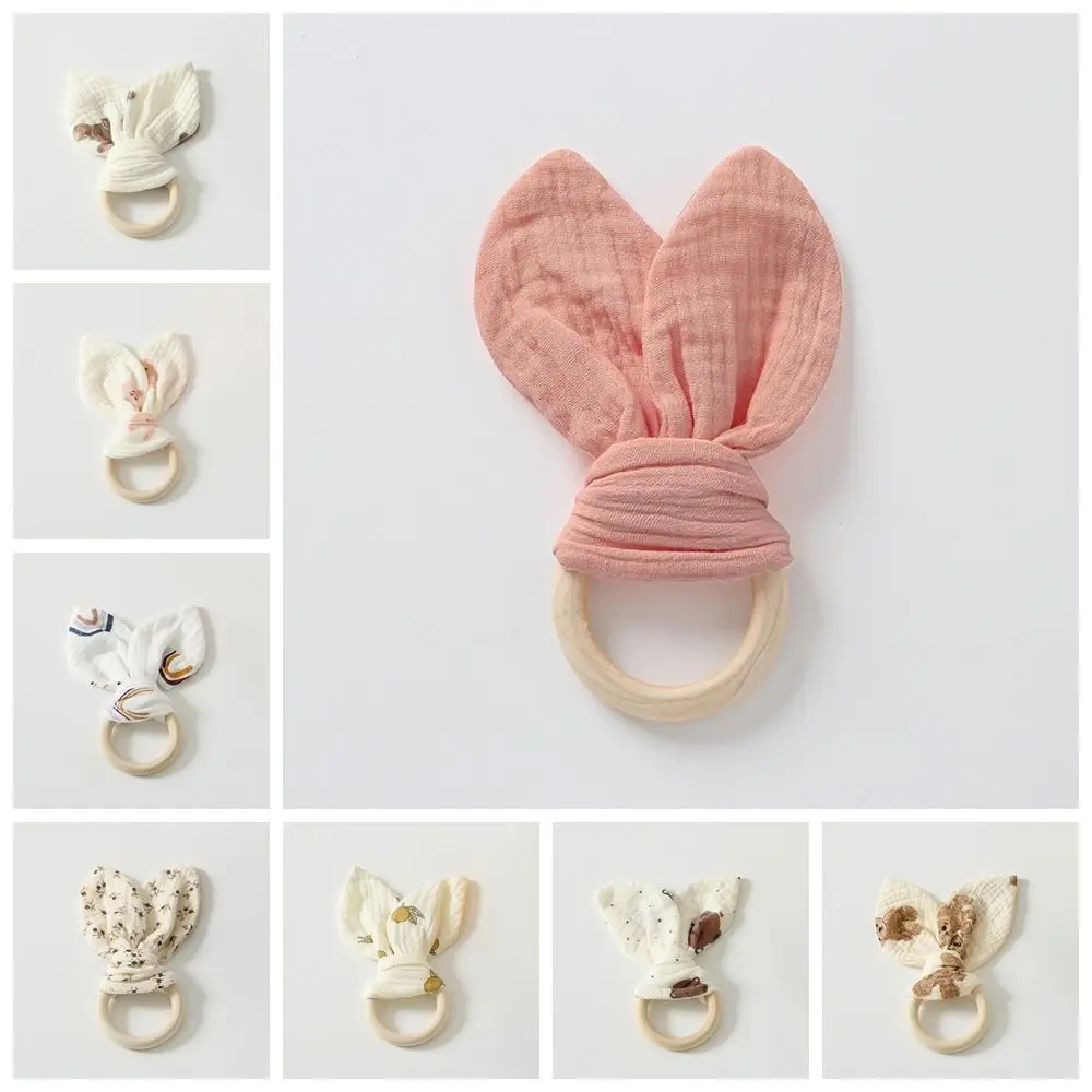 

Soft Baby Wooden Hand Grasp Rabbit Ears Sensory Newborn Teething Ring Bracelet Rattle Natural Wooden Chewing Appease Home