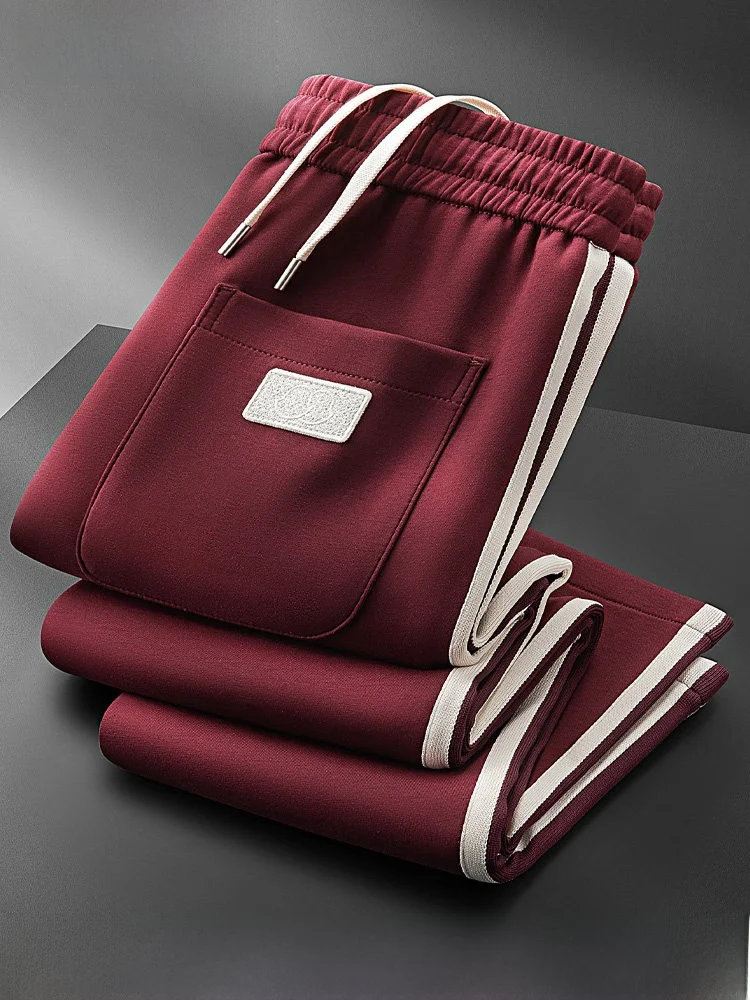 

Мужские повседневные спортивные брюки осенне-зимнего сезона с боковой полосой, тканым поясом, эластичным поясом на резинке, из высококачественного хлопкового трикотажа.