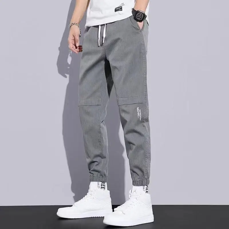 Pantalones Cargo holgados para hombre, pantalón informal con cordón de cintura, coreano, combina con todo, cómodo, primavera y otoño, 2023