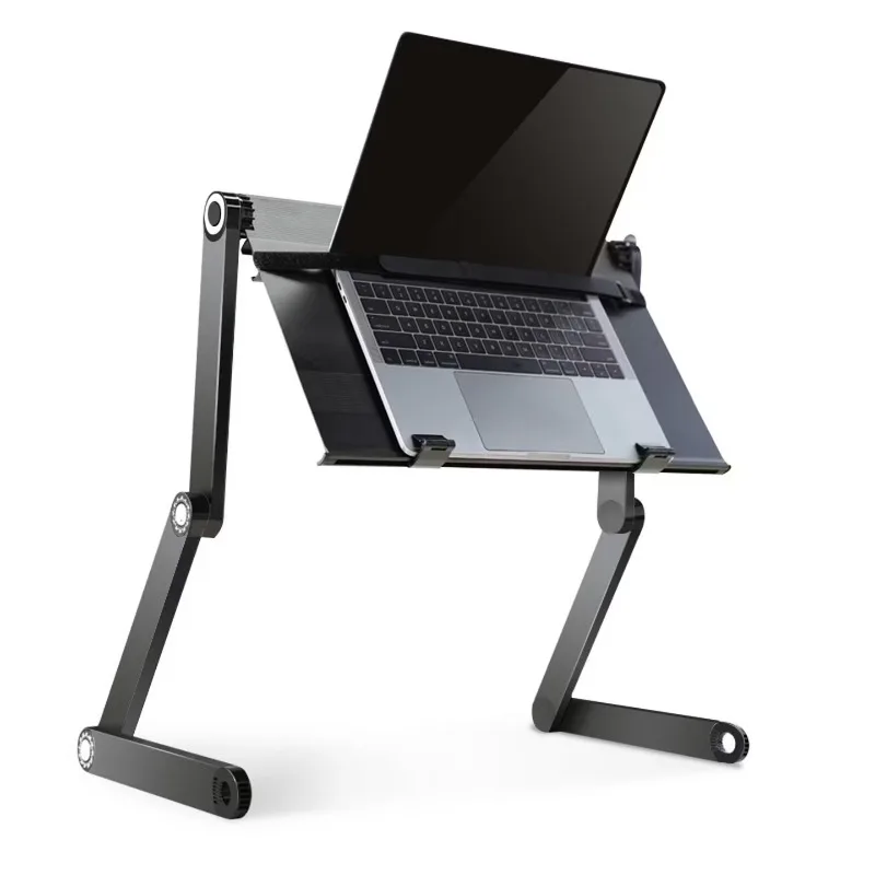 Lying flat on the bed with a laptop computer table Lying flat with a notebook folding bracket waist plate protruding from