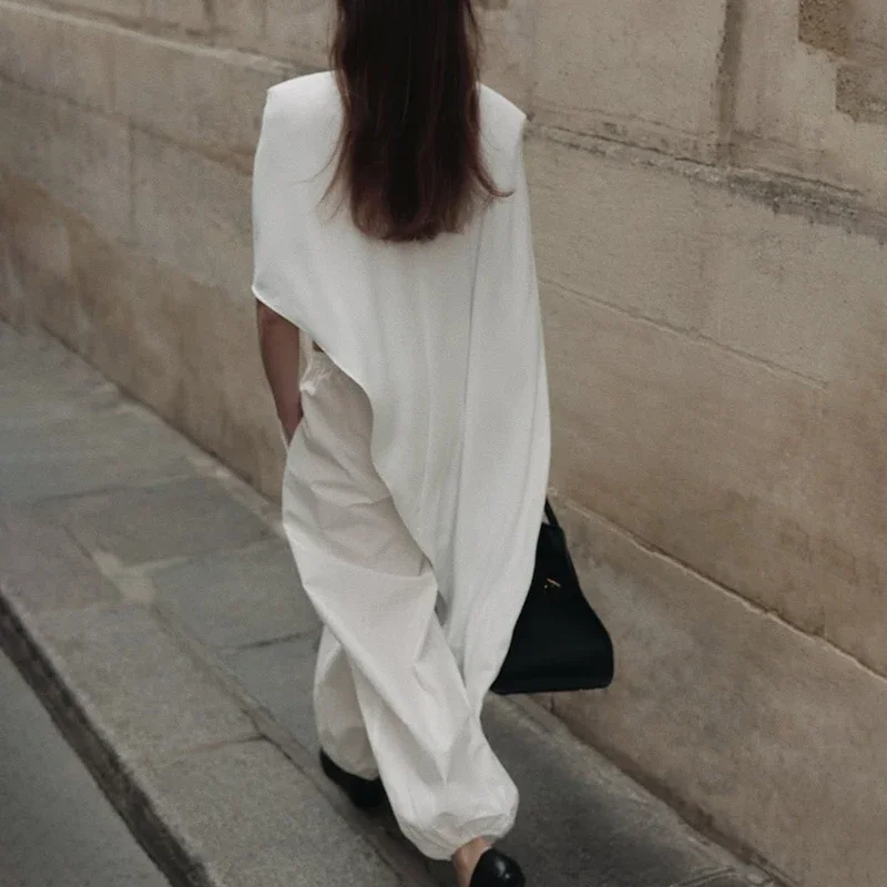 Damska bluzka Fmxires na jesień, jednolita, z zamkiem błyskawicznym z tyłu, asymetrycznym dołem, bez rękawów, luźna, uniwersalna, z wyściełanymi ramionami.