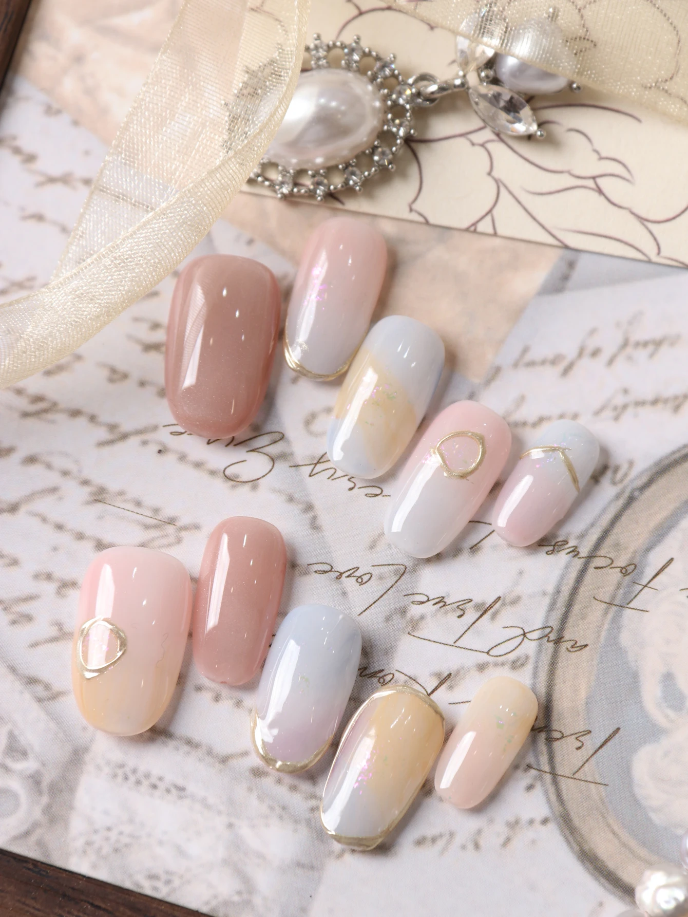 10Pcs Press on Nails Short Pink Blue Yellow Halation Acrylic Press on Fake Nails Includes 1 Sheet of Adhesive Tabs & 1 Pc Mini File