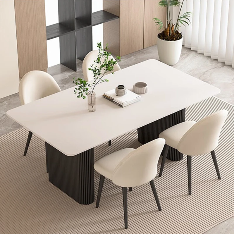 

Обеденный стол из каменной плиты во французском стиле. Современный простой черный прямоугольный обеденный стол и комбинация стульев. Обеденный стол в кремовом стиле.