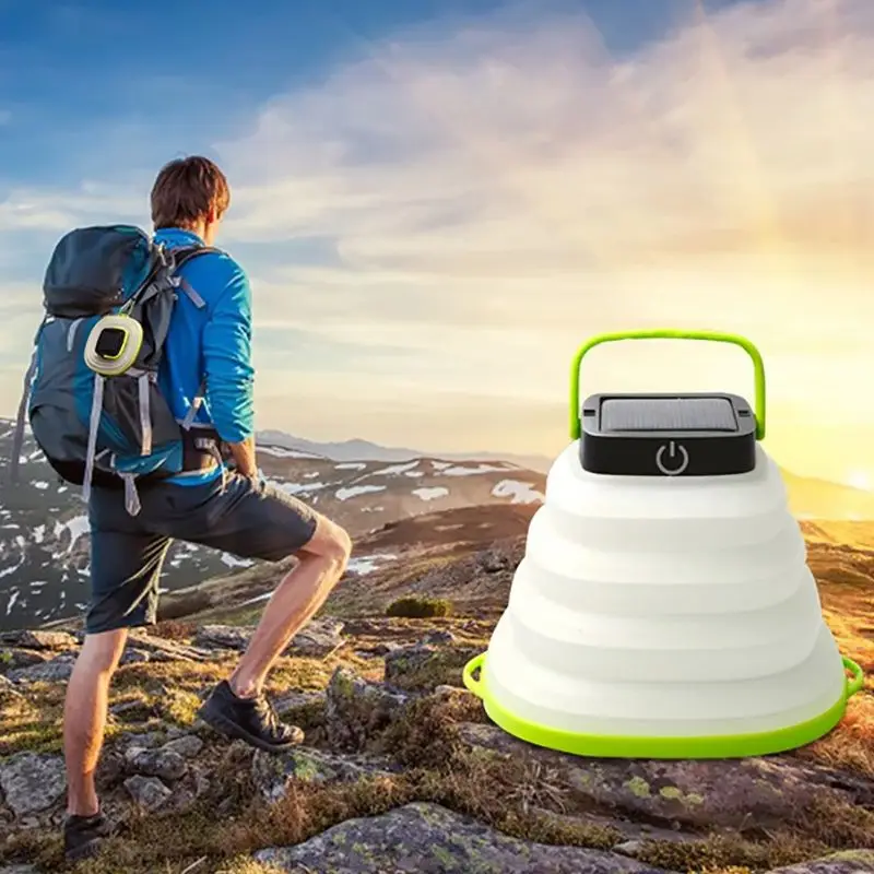 Linterna alimentada por energía Solar LED para acampar, linterna plegable con Cable USB, 3 niveles regulables, resistente al agua