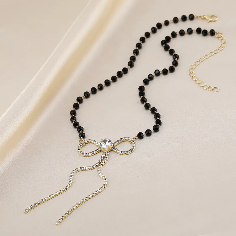 

Unique and fashionable autumn and winter sweater necklaces for women, collarbone necklaces, and bow zircon necklaces