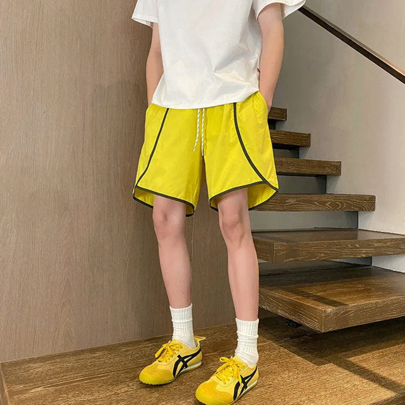 LUZHEN 2025 Estate Stripe Splicing Pantaloncini ad asciugatura rapida Sport Moda uomo Pantaloni casual larghi dritti Vita elastica Nuovo JY2893