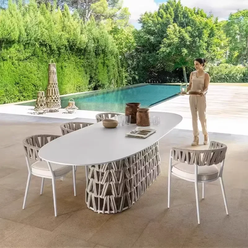 High-End Modern PE Rattan Woven Dining Tables Chairs Durable Outdoor Leisure Furniture Courtyard Garden Villa Hotel