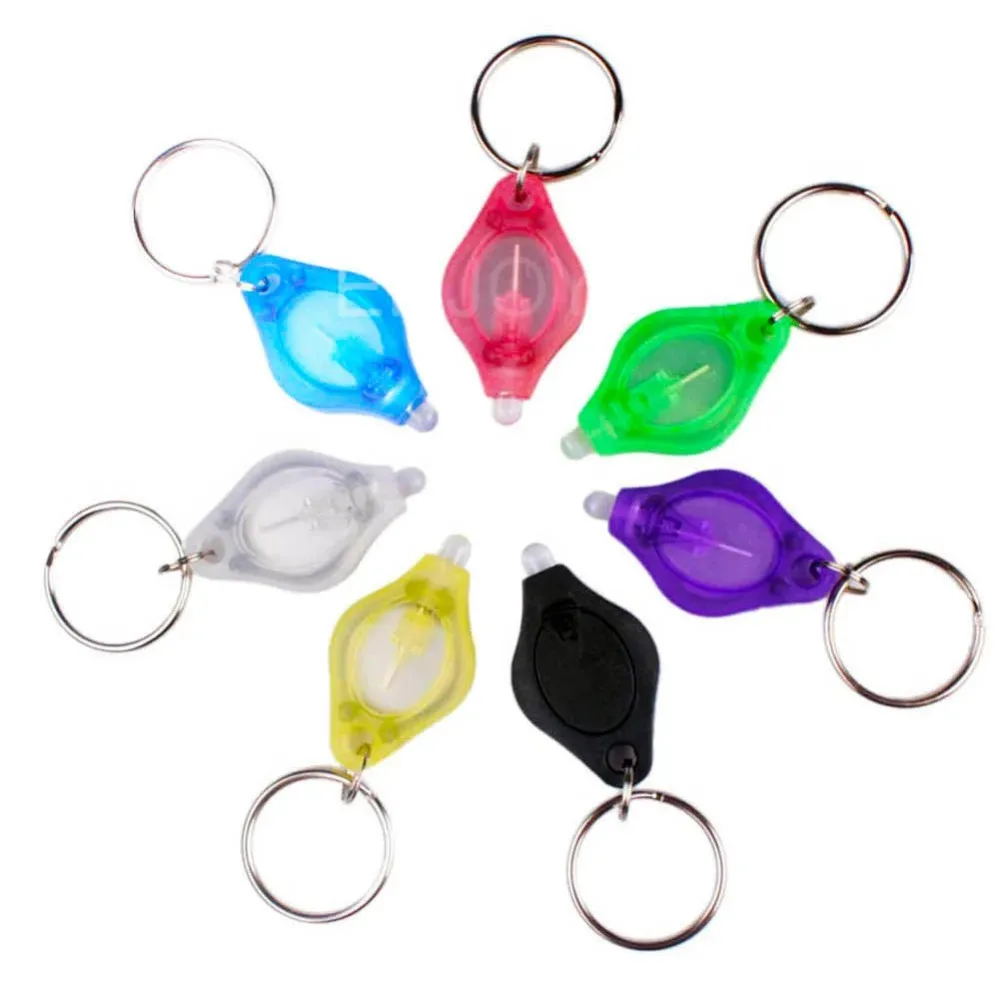 10pcs Mini Keychain Light LED Micro Light Keychain Outdoor Emergency Flashlight ABS Squeeze Light Key Ring For Camping Hiking