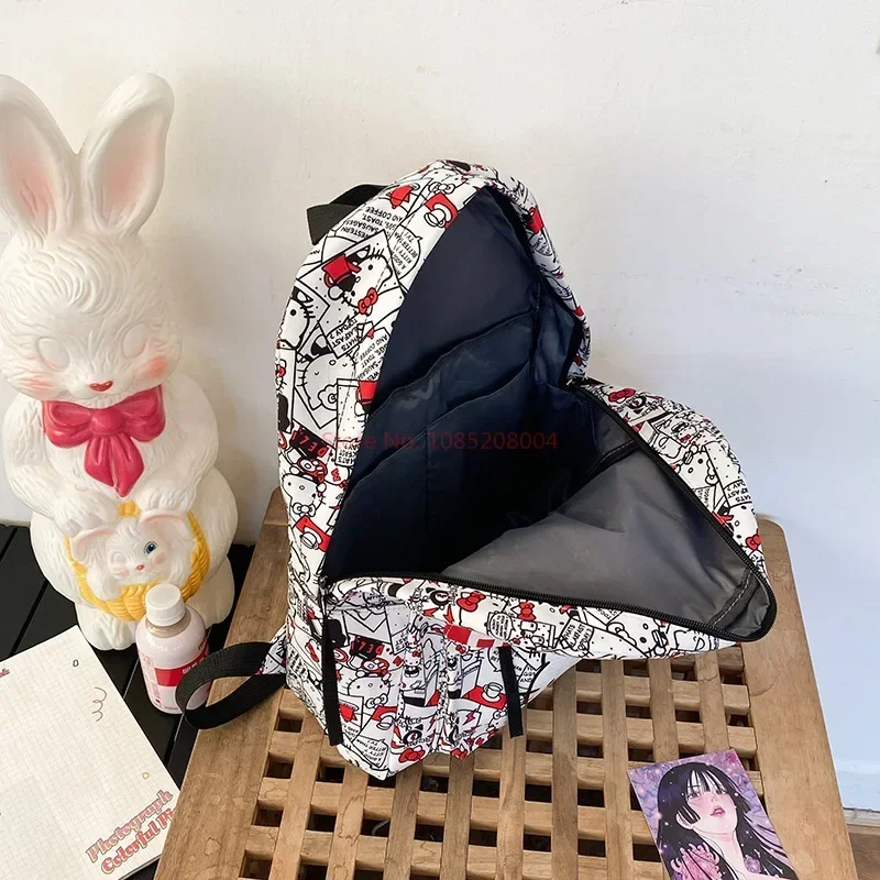 Sanrio mochila escolar de gran capacidad para estudiantes, mochila de Hello Kitty, personalidad de moda y apariencia atractiva