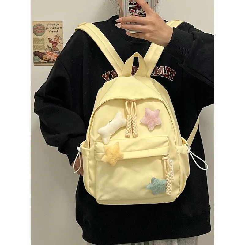 

Cute Star And Bone Dual oulder Bapa for Middle And High School Girls Fre And Versatile Simple Design School Bag