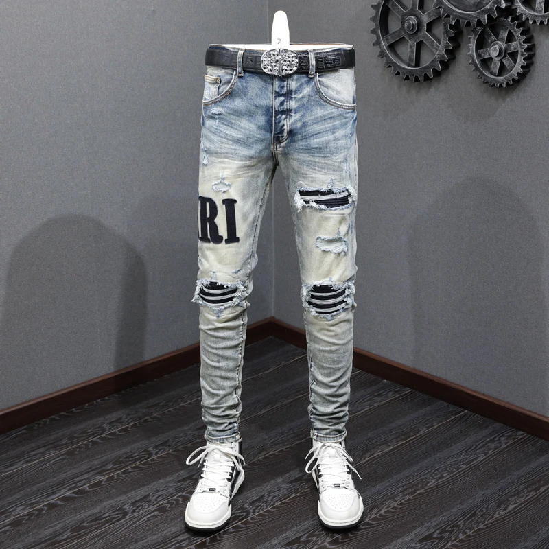 High street fashion celana jeans pria baru, celana pas badan, tambalan berlubang, celana jeans retro biru desainer hip-hop bermerek hombre