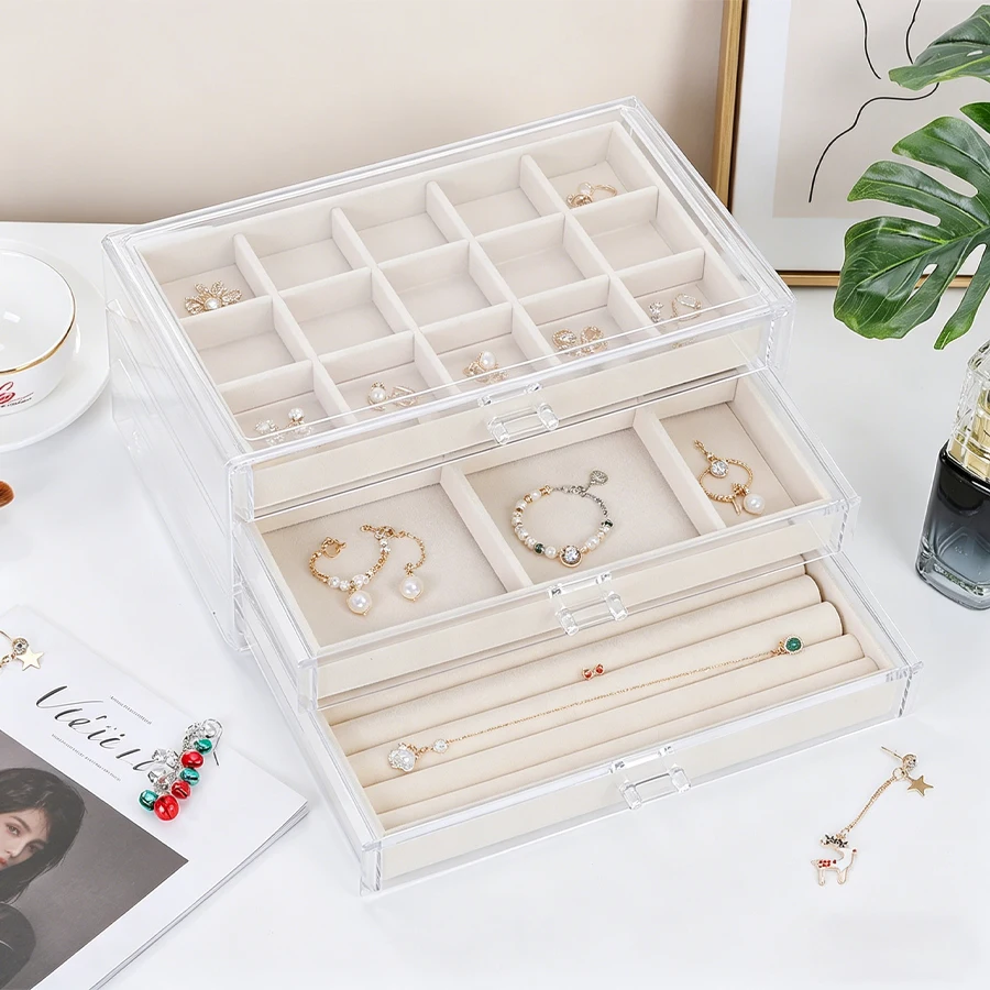 Three-layer 15+ 6+ sponge strip jewelry storage box in light beige color. Jewelry storage drawer with a tabletop for placing and