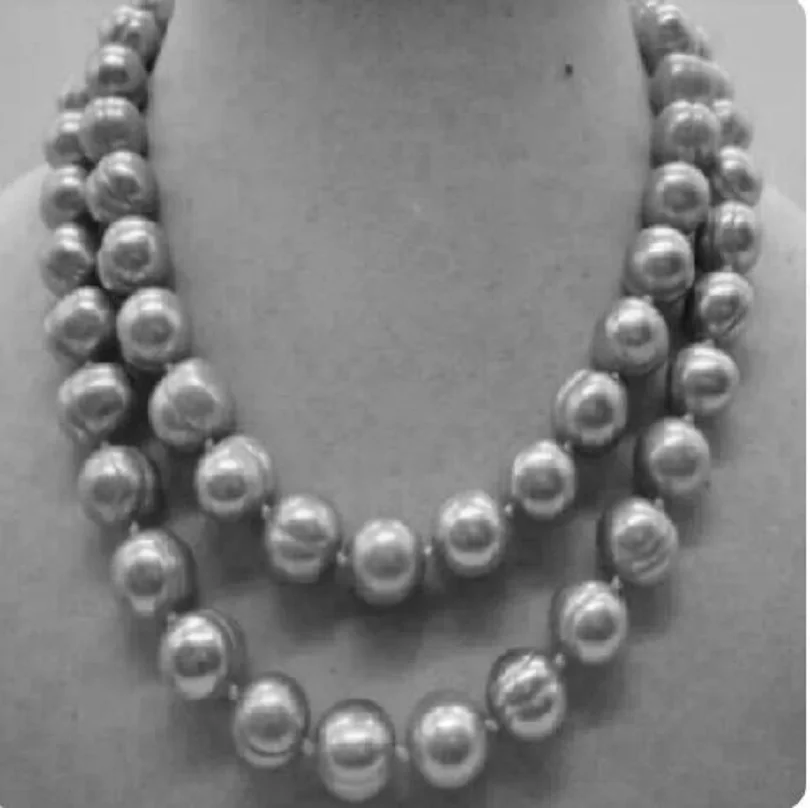 

Best-selling 11-10mm Aaaa South Baroque Silver Grey Pearl Necklace 14K gold 36 inches.