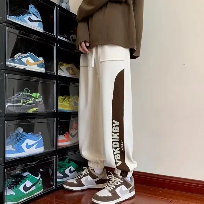 Męskie spodnie dresowe z łączonych kolorów, litery, hip-hopowe spodnie sportowe, ocieplane polarem i bardzo grube, fajne koreańskie spodnie retro Y2k.