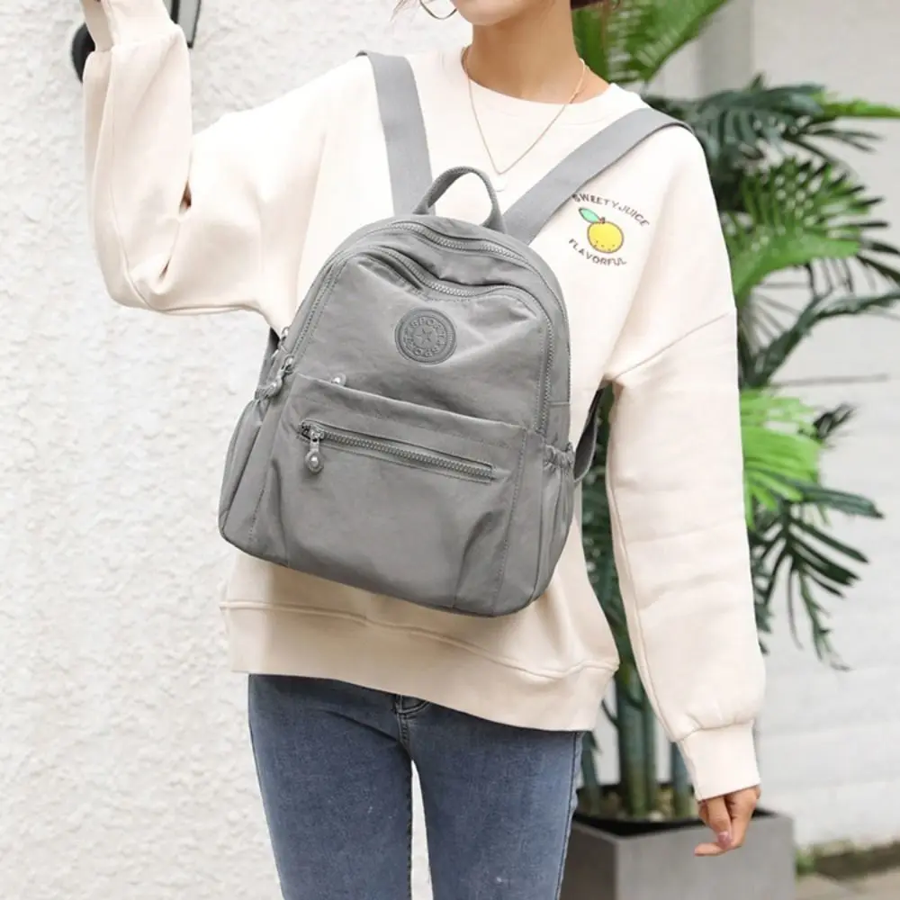 Casual กระเป๋าสะพายไหล่ความจุขนาดใหญ่กันน้ําน้ําหนักเบา Mini Rucksack สวมใส่กระเป๋าเป้สะพายหลังขนาดเล็กโรงเรียน