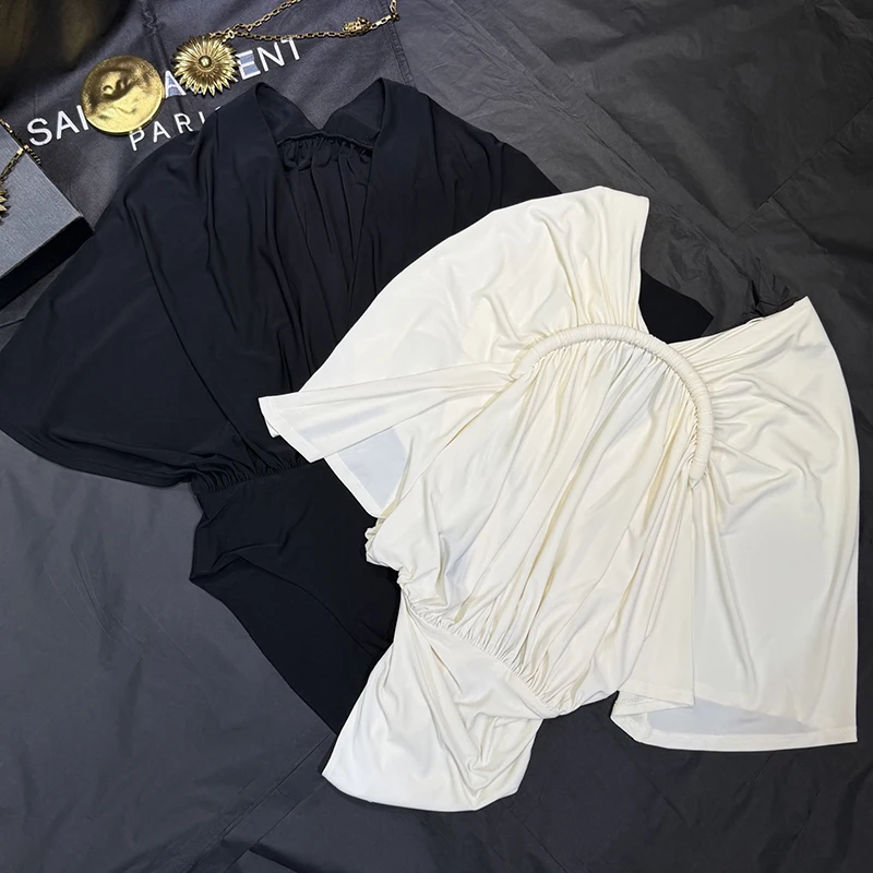 Stylish and sophisticated deep-V bodysuit; a sexy, elegant women's top—new for Autumn 2026.