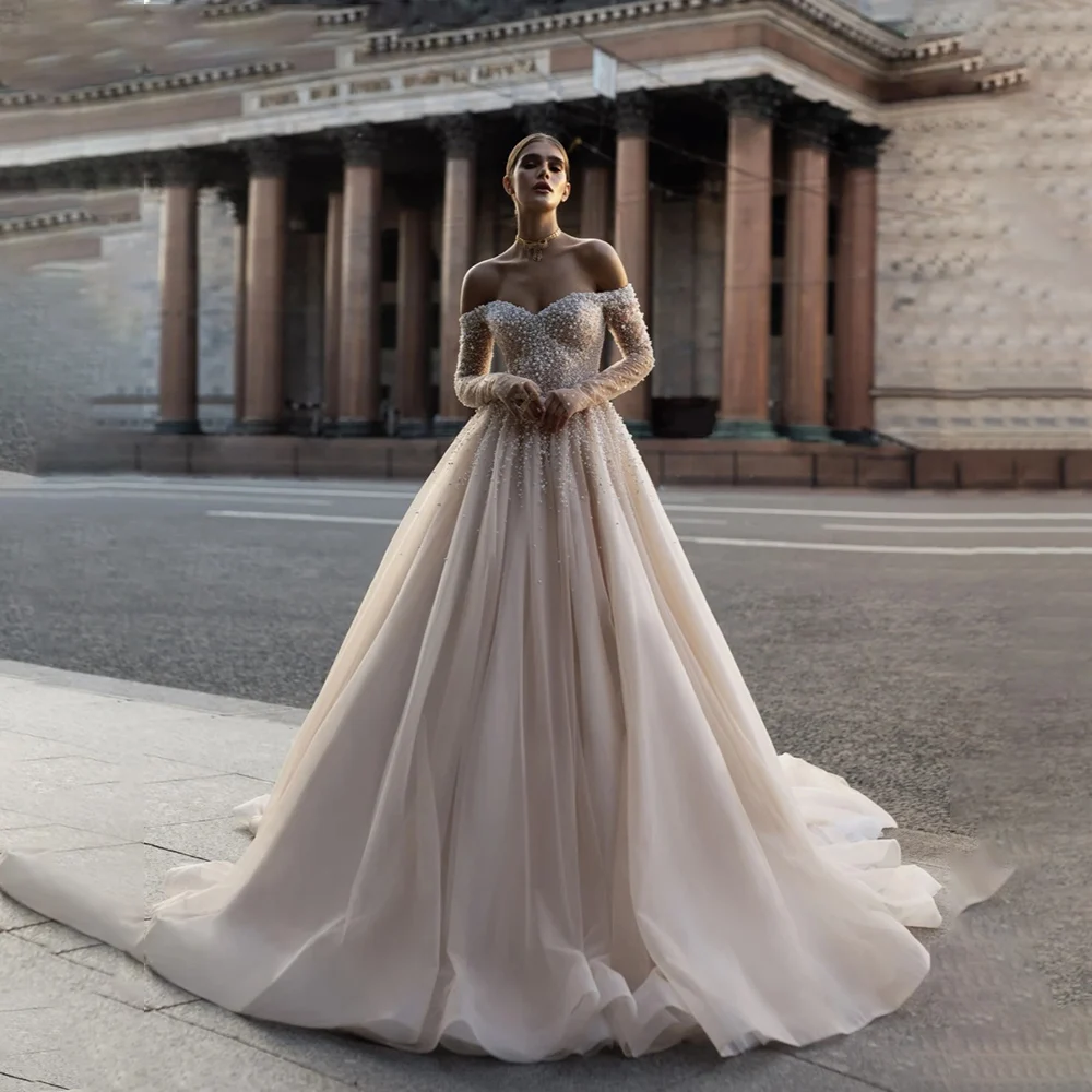 Luxury A Line Bridal Gowns 2024 Boat Neck Long Sleeve Backless Bead Wedding Dress Customized High Quality Princess Bride Dress