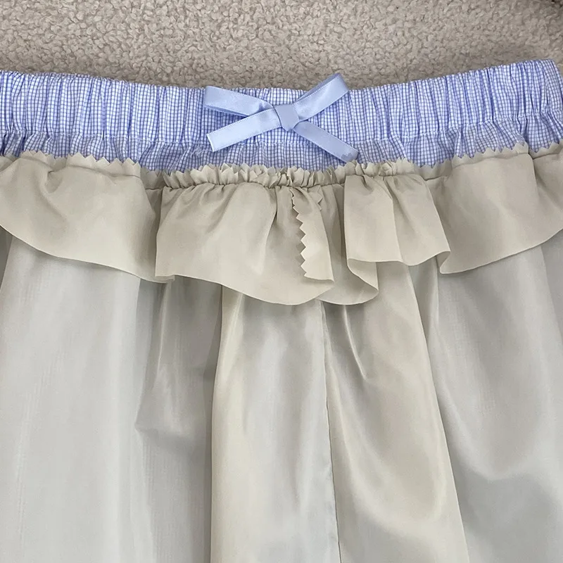 여름 2025 새로운 스타일 컬러 블록 더블 헤드 허리 스플 라이스 미디 스커트 독특하고 세련된 캐주얼 여성 드레스 스커트