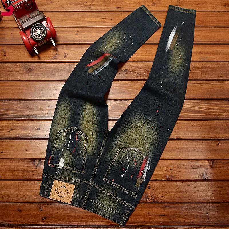 Fashion stitching motorcycle jeans men's Hole & patch printed graffiti slim fit skinny stretch Street handsome retro long pants